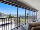 Balcony overlooking the city, Intracoastal Waterway, and nearby buildings with clear skies on a sunny day at 1460 Gulf Blvd # 509, Clearwater Beach, FL 33767