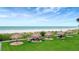 Umbrellas provide shade over seating on the beach at 1460 Gulf Blvd # 509, Clearwater Beach, FL 33767