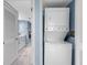 A bright laundry area conveniently located near the bathroom offers a stackable washer and dryer at 1460 Gulf Blvd # 509, Clearwater Beach, FL 33767