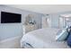 Serene bedroom featuring a comfortable bed and ample natural light at 1460 Gulf Blvd # 509, Clearwater Beach, FL 33767
