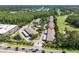 Wide aerial view showing this community's proximity to golf course, pond, pool and surrounding areas at 14910 Par Club Cir, Tampa, FL 33618