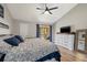 Comfortable bedroom with wood floors, and outdoor views at 14910 Par Club Cir, Tampa, FL 33618