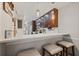 Eat-in kitchen offers a breakfast bar with stylish pendant lighting and modern design at 14910 Par Club Cir, Tampa, FL 33618