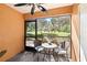 Screened patio with views of green space at 14910 Par Club Cir, Tampa, FL 33618