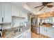 Well-equipped kitchen featuring granite countertops, stainless steel appliances, and ample storage at 1500 Sunset Rd # F8, Tarpon Springs, FL 34689
