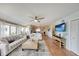 Spacious living area with stylish furnishings and an open floor plan at 1500 Sunset Rd # F8, Tarpon Springs, FL 34689