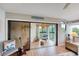 Cozy sunroom area with a view and casual seating arrangement at 1500 Sunset Rd # F8, Tarpon Springs, FL 34689