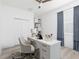 Comfortable home office featuring modern desk, comfortable chair and storage at 1808 E Comanche Ave, Tampa, FL 33610