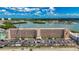 Aerial view of Shorecrest showcasing parking, community landscaping and stunning waterfront at 1847 Shore S Dr # 204, South Pasadena, FL 33707