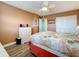 This bedroom features light wood floors, neutral walls, a ceiling fan and closet at 1847 Shore S Dr # 204, South Pasadena, FL 33707