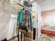 This closet has a variety of storage options, including shelves and rods for hanging clothes at 1847 Shore S Dr # 204, South Pasadena, FL 33707