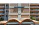 Exterior view of the Shorecrest building facade with signage and address number at 1847 Shore S Dr # 204, South Pasadena, FL 33707
