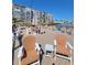 Community waterfront deck with ample seating for residents and guests at 1847 Shore S Dr # 204, South Pasadena, FL 33707
