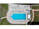 Aerial view of community pool with sun loungers on well-maintained grounds at 1847 Shore S Dr # 204, South Pasadena, FL 33707