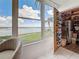 View from the sitting area with large window, storage, and view of the bay at 1847 Shore S Dr # 204, South Pasadena, FL 33707