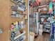 Walk-in storage room with shelving for organization and functionality at 1847 Shore S Dr # 204, South Pasadena, FL 33707