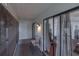Spacious covered balcony with a seating area, offering outdoor living space at 2213 Hammock Pine Blvd, Clearwater, FL 33761