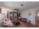 Bright living room with a view of the covered balcony and lots of natural light at 2213 Hammock Pine Blvd, Clearwater, FL 33761