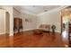 Spacious living room with hardwood floors and elegant decor at 2220 Muirfield Way, Oldsmar, FL 34677