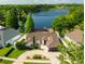 Stunning waterfront property with a well-maintained yard and private dock on a serene lake at 2347 Foggy Ridge Pkwy, Land O Lakes, FL 34639