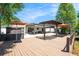 Multi-level deck featuring retractable awning, hot tub, and waterfront views at 2347 Foggy Ridge Pkwy, Land O Lakes, FL 34639
