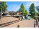 Multi-level deck with fire pit and a scenic lake view at 2347 Foggy Ridge Pkwy, Land O Lakes, FL 34639