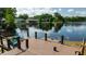 Relaxing backyard dock featuring comfortable seating, perfect for enjoying waterfront views and tranquility at 2347 Foggy Ridge Pkwy, Land O Lakes, FL 34639