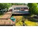 Expansive deck on waterfront home offers multiple seating and lounging areas with dock at 2347 Foggy Ridge Pkwy, Land O Lakes, FL 34639