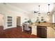 Eat-in kitchen with granite countertops, stainless steel appliances, and tile backsplash at 2347 Foggy Ridge Pkwy, Land O Lakes, FL 34639