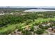 Picturesque aerial view of home located by a golf course and lake, offering beautiful scenery at 2616 Fairway S Ave, St Petersburg, FL 33712
