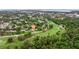 Expansive aerial shot of a home nestled on a golf course, surrounded by trees and landscaping at 2616 Fairway S Ave, St Petersburg, FL 33712