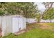 Backyard featuring a white storage shed at 2616 Fairway S Ave, St Petersburg, FL 33712