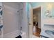 Bathroom featuring a shower/tub combination, a vanity, and a large mirror at 2616 Fairway S Ave, St Petersburg, FL 33712