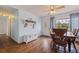 Inviting dining room with wooden floors, vintage furniture and natural light, perfect for gatherings at 2616 Fairway S Ave, St Petersburg, FL 33712
