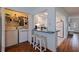 Charming kitchen with a breakfast bar, updated appliances, and laundry area for added convenience at 2616 Fairway S Ave, St Petersburg, FL 33712
