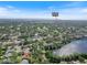 Aerial view of the property with the Philippe Park in the distance at 2673 Clubhouse S Dr, Clearwater, FL 33761
