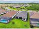 Aerial view of homes showcasing a community layout and enclosed backyards at 29356 Ginnetto Dr, Wesley Chapel, FL 33543