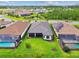 Aerial view of homes showcasing a community layout and enclosed backyards at 29356 Ginnetto Dr, Wesley Chapel, FL 33543