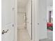 Hall bathroom with tub-shower combo and access to bedroom at 29356 Ginnetto Dr, Wesley Chapel, FL 33543