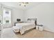Bright bedroom with natural light, neutral tones, and comfortable furniture at 29356 Ginnetto Dr, Wesley Chapel, FL 33543