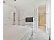 Comfortable bedroom with a view of the en suite bathroom at 29356 Ginnetto Dr, Wesley Chapel, FL 33543