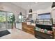 A bright cafe featuring an espresso bar, display cases, and indoor seating, perfect for residents to gather and socialize at 29356 Ginnetto Dr, Wesley Chapel, FL 33543