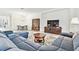 Bright living room with open floor plan, comfortable seating, and elegant decor at 29356 Ginnetto Dr, Wesley Chapel, FL 33543