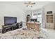 Well-lit home office with modern desk and ample storage space at 29356 Ginnetto Dr, Wesley Chapel, FL 33543