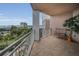 Balcony with bench and potted palm offering city and water views at 331 Cleveland St # 402, Clearwater, FL 33755