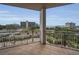 Lovely balcony with tiled floors overlooking city and bay views with a white railing in a modern style at 331 Cleveland St # 402, Clearwater, FL 33755