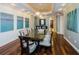 Beautiful dining room featuring a large table with seating for ten and modern decor at 331 Cleveland St # 402, Clearwater, FL 33755