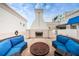 Cozy outdoor fireplace with comfortable seating perfect for relaxation at 331 Cleveland St # 402, Clearwater, FL 33755