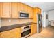 This renovated kitchen features maple cabinets, stainless appliances and sleek countertops at 331 Cleveland St # 402, Clearwater, FL 33755