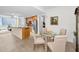 A bright kitchen and dining area offers an open layout with tile flooring and ample natural light at 331 Cleveland St # 402, Clearwater, FL 33755